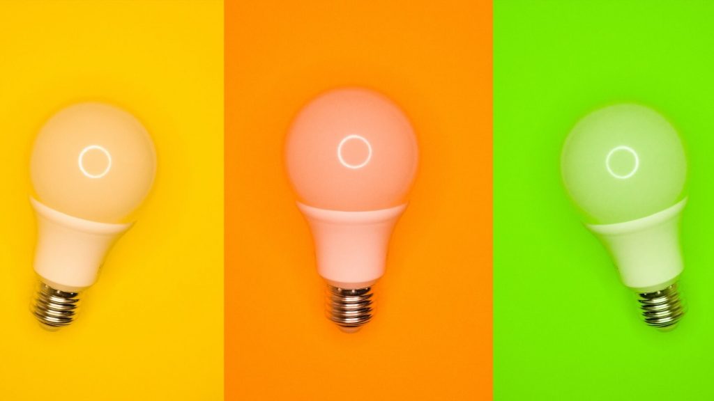 Three LED lamps on colored backgrounds
